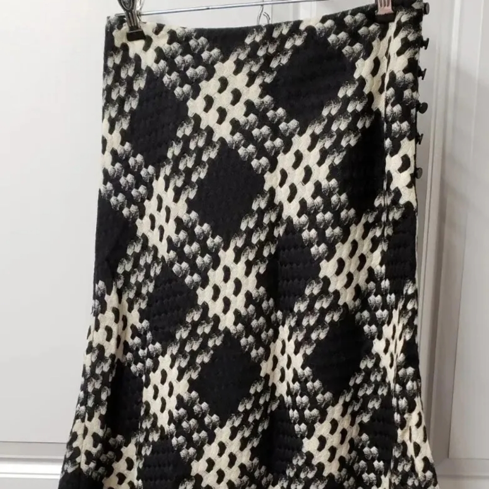 Express Women's Skirt Size: 1/2 Button Up on the side Lambswool